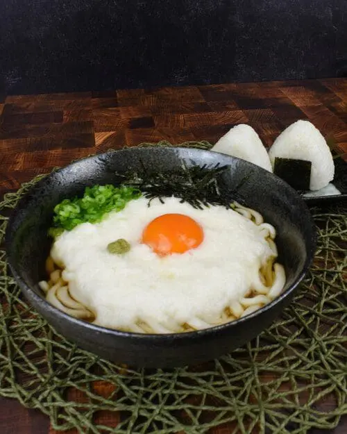 Yamakake Udon (Udon topped with grated yamaimo) topping with egg yolk, inspired by Kimetsu no Yaiba a.k.a. Demon Slayer and the main character Tanjiro