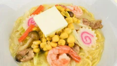 Nagasaki Champon (a regional dish of Nagasaki, Japan) topping with butter and corn with seafood and vegetables