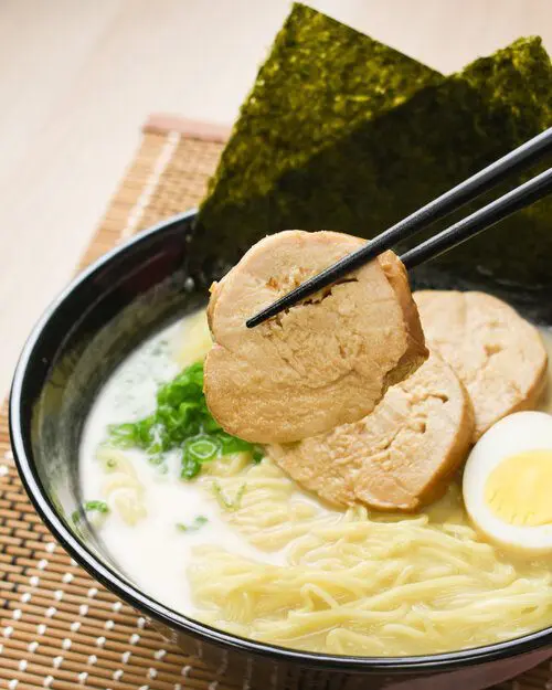 Slowly cooked chicken chashu on top of ramen