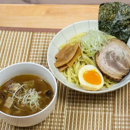 Okinawa Soba Tsukemen (dipping noodle) topping with chashu (braised pork belly), menma (braised bamboo shoots), ajitsuke egg (marinated boiled egg), scallion, and seaweed (nori)