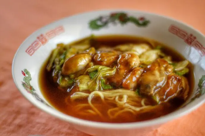 Premium Vegetarian Shoyu Ramen topping with oysters and lettuce