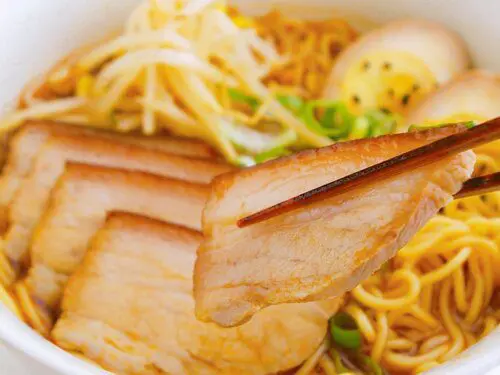 Sliced homemade chashu on top of ramen