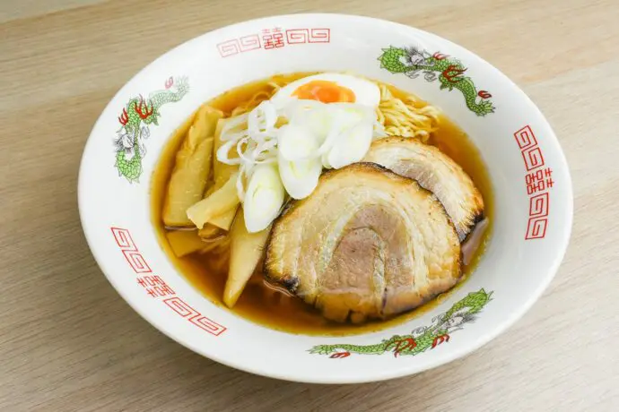 Myojo-style Takayama Ramen which is a regional food from Gifu, Japan with wavy noodles and light soup made with soy sauce and bonito dashi