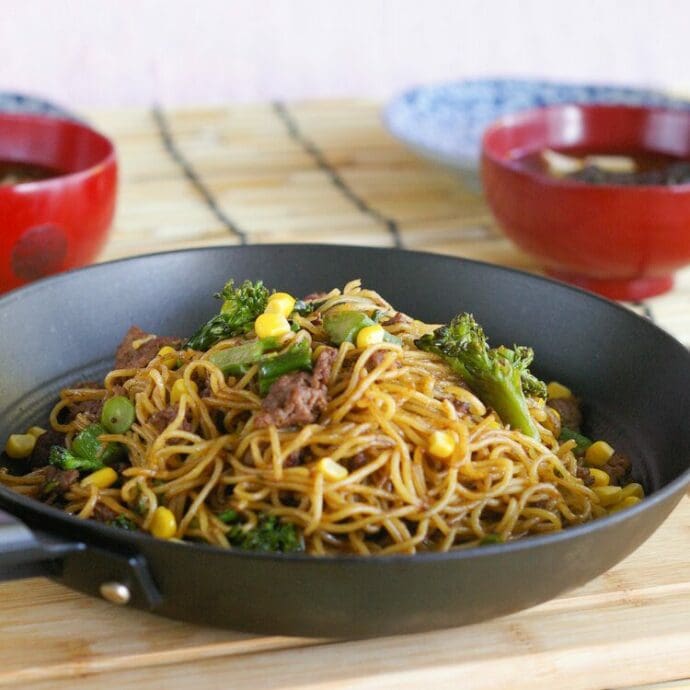 Signature Original Yakisoba mixed with hamburger patty, broccoli, and corn