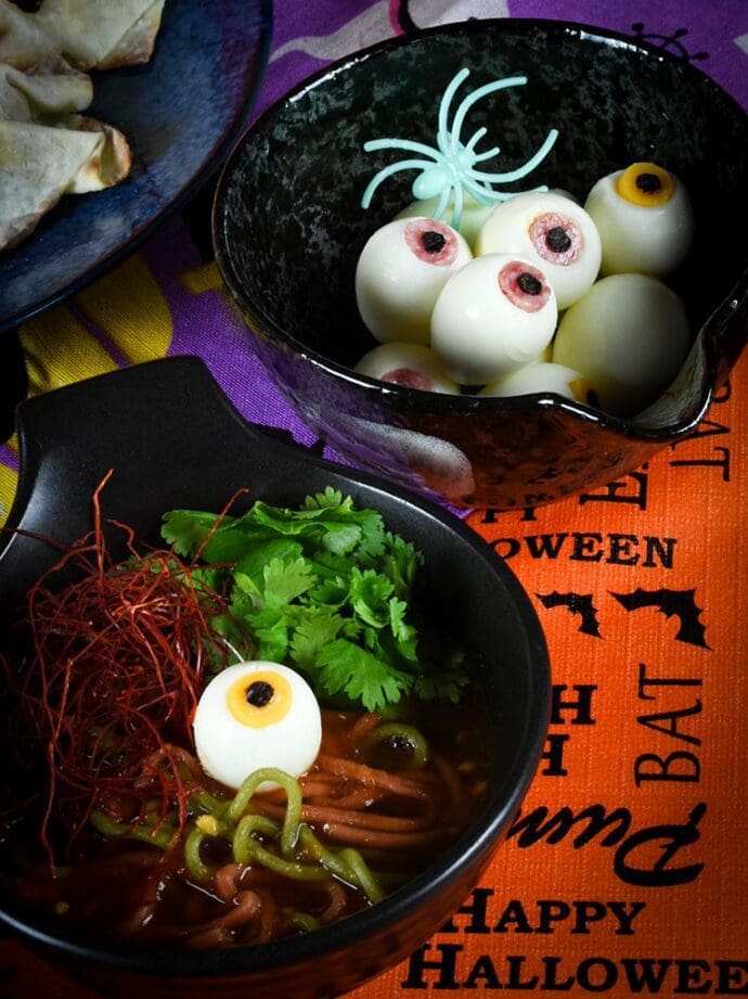 Premium Vegetarian Shoyu Ramen with spooky eyeball topppings made with quail eggs