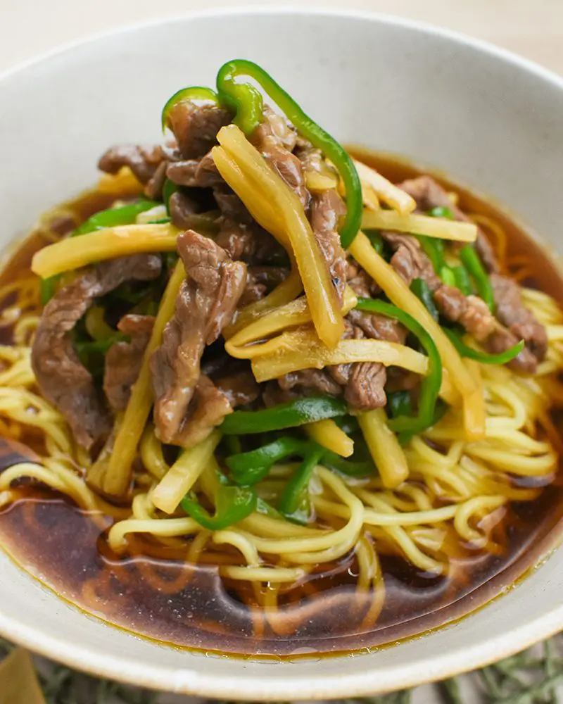 Signature Shoyu Ramen topping with Chinese shredded beef with green pepper