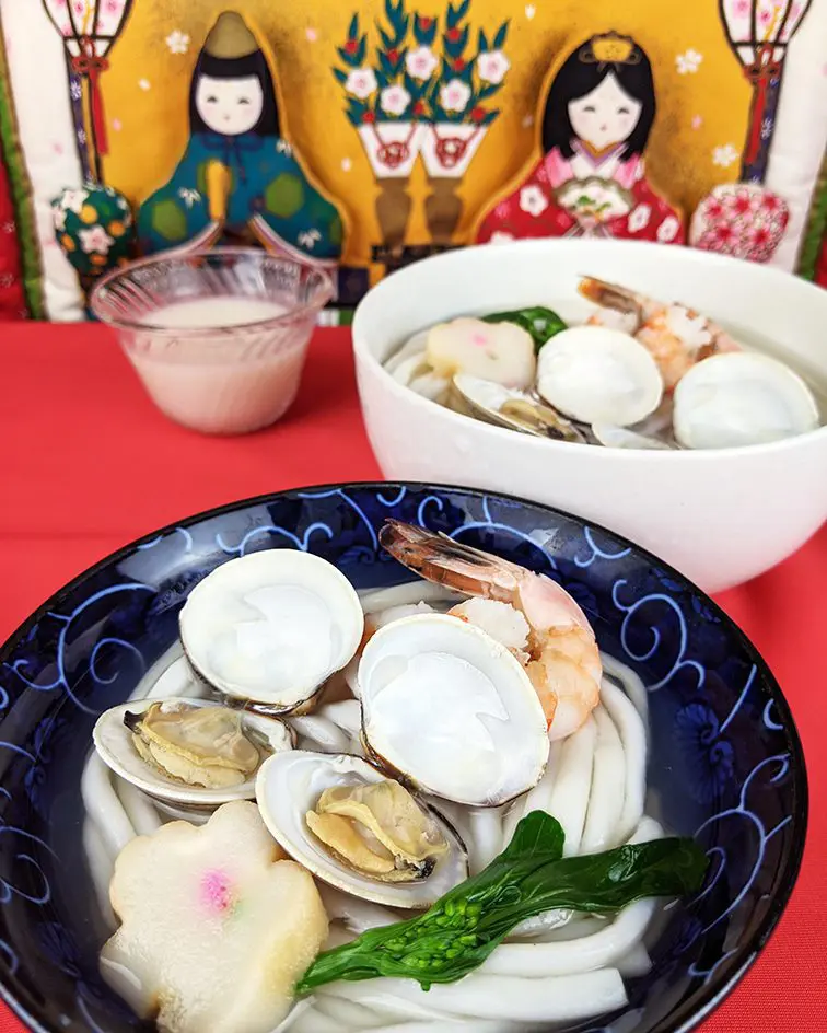 Hamaguri Osuimono (clam soup), a clear Japanese soup that is cooked with clams and dashi, with Jumbo Udon Noodles Only topping with shrimp, chinese broccoli, hana-fu (flower-shaped bran)