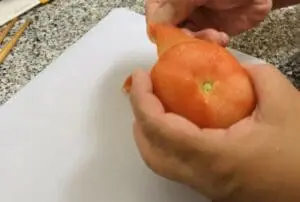 Hiyashi Chuka with Tomato Sauce Step 2 - Peel the skin off a tomato