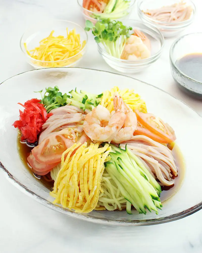 Original Hiyashi Chuka topping with egg, tomato, cucumber, ham, and shrimp