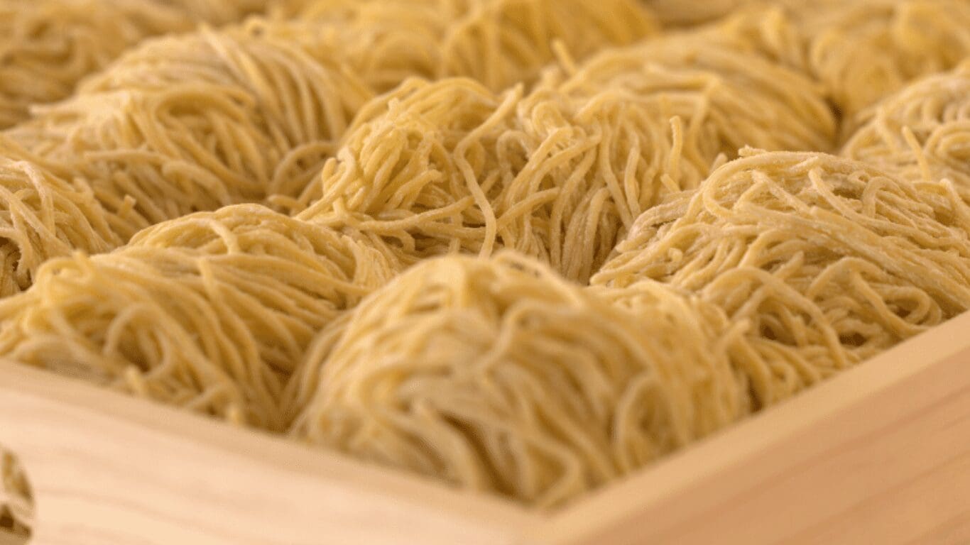 Fresh ramen noodles in a wooden box