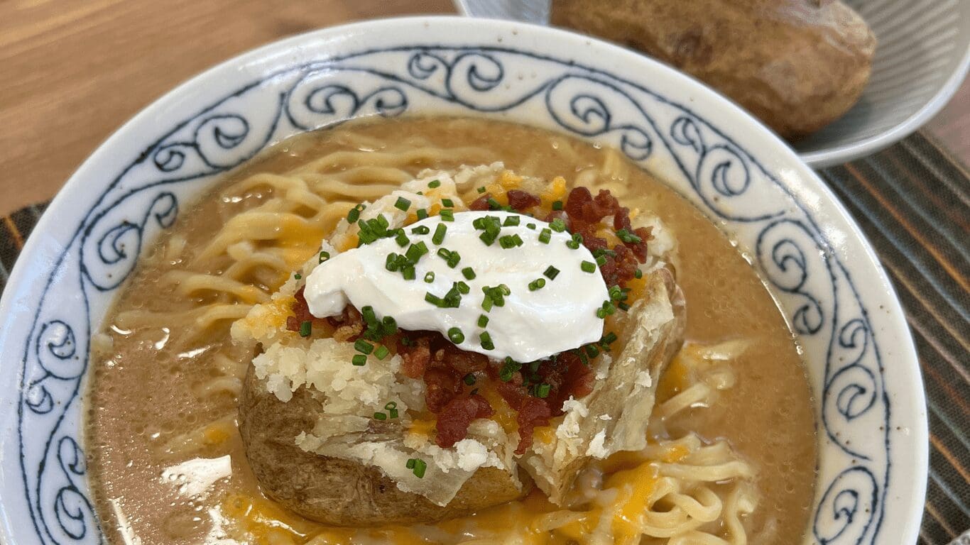 Ramen noodles with baked potato and sour cream as toppings