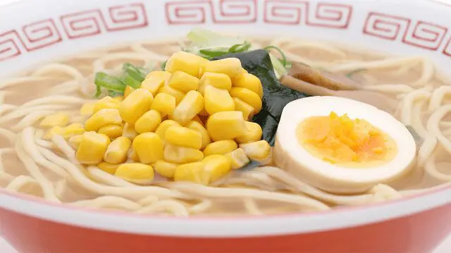 Corn served on top of ramen noodles