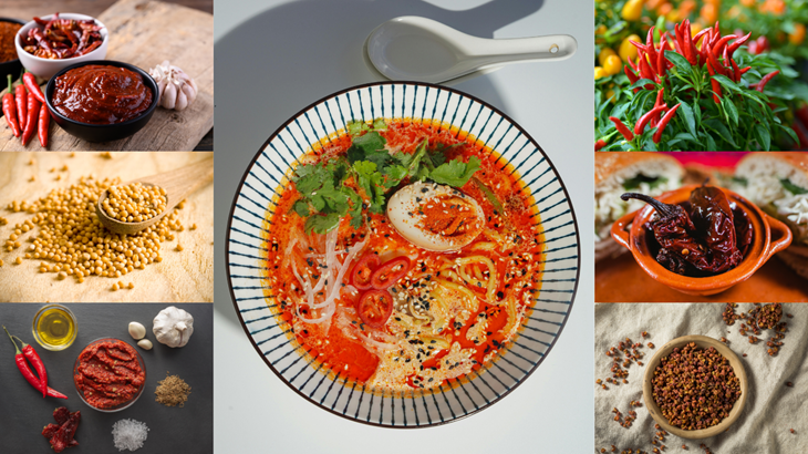 Spicy ramen bowl in the center surrounded by various spicy ingredients: gochujang paste, bird's eye chili, mustard seeds, harissa paste, chipotle peppers, and Szechuan peppercorns