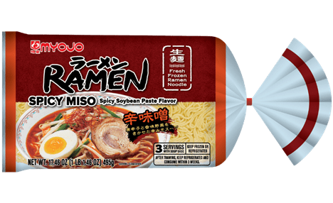 Package of Myojo Spicy Miso Ramen with an image of ramen noodles, egg, meat, and vegetables on the front. Label reads 'Spicy Soybean Paste Flavor' and 'Fresh Frozen Ramen Noodle'