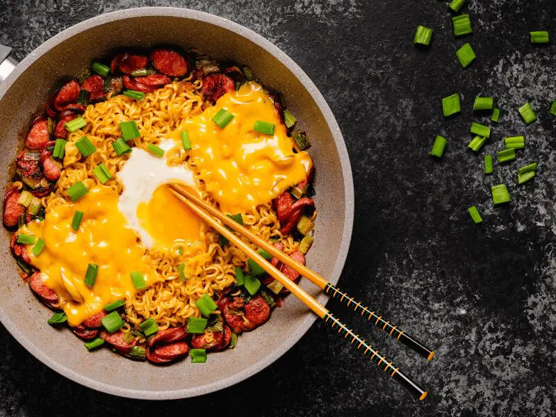 Korean-style instant noodles topped with cheese and egg